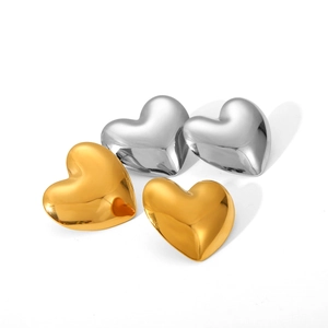 Polished heart-shaped stud earrings in gold and silver finish on white background