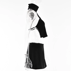 Side view of black halter top and mini skirt set with backless design on clear mannequin