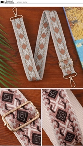 Detailed view of bohemian woven bag strap with geometric pattern and gold buckles