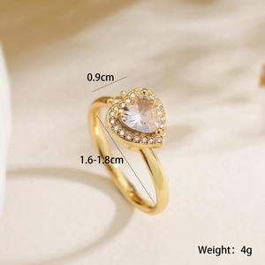 Macro shot of gold heart ring with dimensions 0.9cm width and 1.6-1.8cm diameter