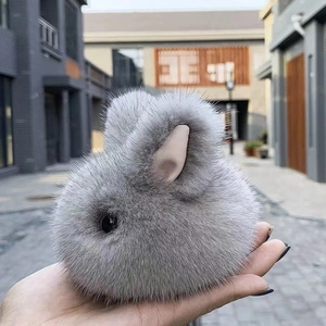 Cute grey faux fur bunny plush keychain accessory with soft fluffy texture for bags