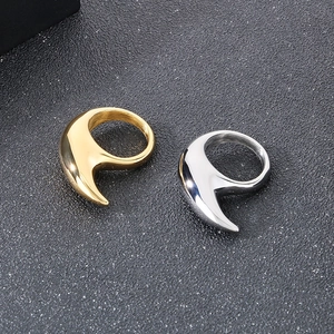 Polished crescent moon rings in gold and silver finish with sharp geometric horn shapes
