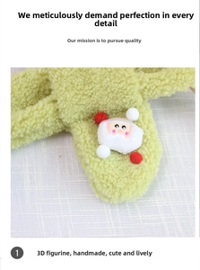 Detail of light green fleece scarf featuring a handmade 3D plush Santa Claus decoration