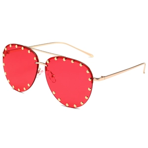 Classic aviator sunglasses with gold metal frame, red lenses and rivet details