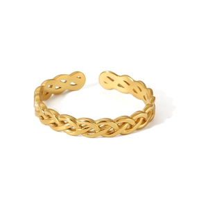 Close-up of woven texture gold adjustable ring with open design in polished finish