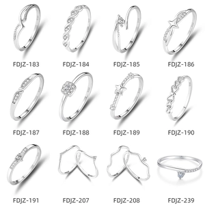 Matrix of 12 minimalist S925 sterling silver rings with cubic zirconia and engraved logos
