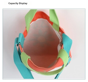 Top view of kids canvas bag showing internal storage capacity and white zipper detail