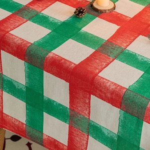 Classic red and green plaid Christmas tablecloth in retro cotton linen woven texture