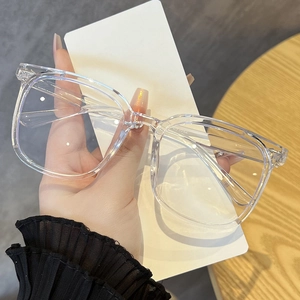 Detail of transparent large square frames with decorative rice studs on hand display