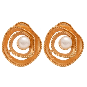 Vintage gold spiral flower stud earrings with matte metal texture and center pearl
