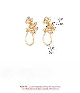 Detailed size and dimension view of gold leaf shaped clip earrings with white rhinestones