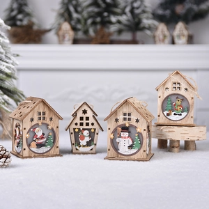 Illuminated Christmas wooden cabin ornaments with festive snowman and reindeer designs