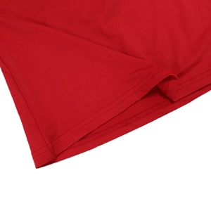 Close-up of red bodycon dress hem featuring high-quality double-needle stitching details