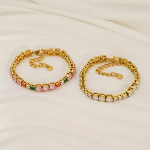 Detail of gold-plated tennis bracelet with multi-color oval-cut zircon gemstones