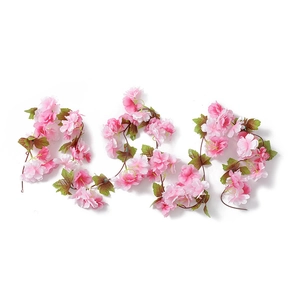 Elegant artificial cherry blossom vine with pink silk flowers for wedding and home decor