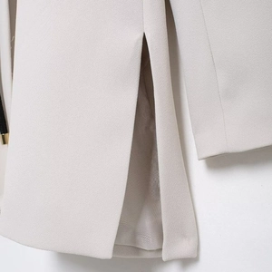 Elegant beige V-neck blazer with side slit detail and woven textured fabric for women