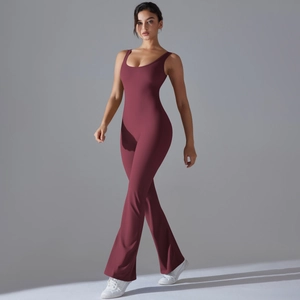 Detailed side view of deep red flared yoga jumpsuit featuring elegant open back design