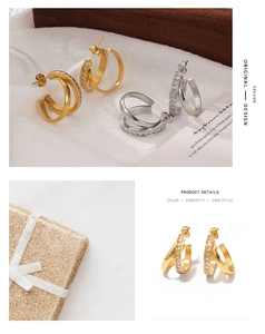 Close-up of double hoop earrings with pave-set cubic zirconia in gold and silver finish