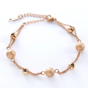 Minimalistische roestvrijstalen dubbele armband met matte en gepolijste kralen in roségoud
