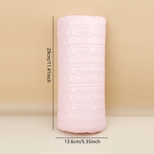 Pink heart quilted manicure armrest pillow with dimensions 29cm height and 13.6cm diameter