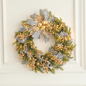 50cm green Christmas wreath with gold berries, bow, and warm LED lights for door decor