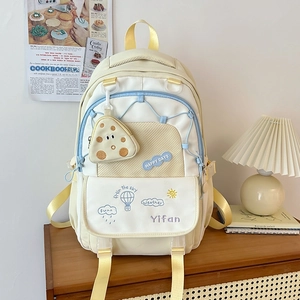 Lightweight large capacity school backpack in beige and blue color block design