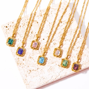 Golden stainless steel rope necklaces with colorful rectangular zircon stones set on a stone
