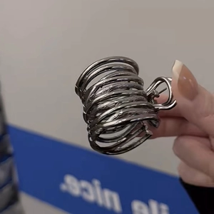 Close-up of a silver spiral metal hair claw clip for high ponytail styling