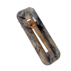 Rectangle acrylic hair clip with dark grey marble texture and golden metal spring