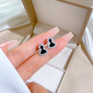 Minimalist silver titanium steel wulu stud earrings with black inlay and white zircon stones