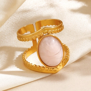 18K gold plated stainless steel ring featuring an oval pink stone on white silk