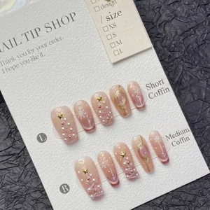 Handmade Christmas cat eye press-on nails with 3D pearls and snowflake patterns
