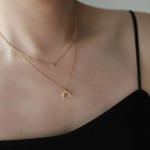 Double-layered 18K gold plated titanium necklace with green zircon and crescent pendant