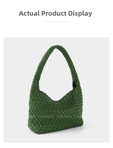 Detailed view of dark green woven leather texture on a high-end hobo handbag