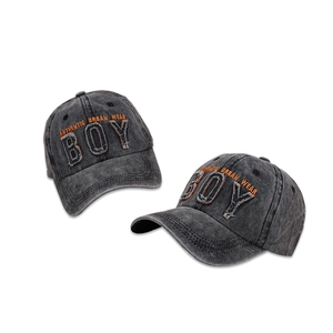 Washed dark grey baseball cap with orange embroidery and frayed urban street patches