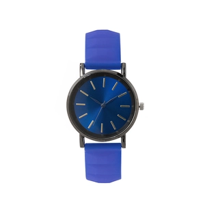 Minimalist women's quartz watch with blue sunray dial and textured silicone strap