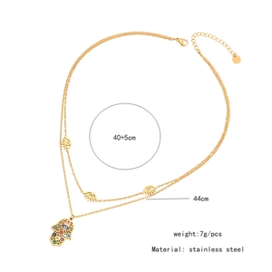 Detail showing dimensions 40+5cm, 44cm and 7g weight for the Hamsa hand necklace