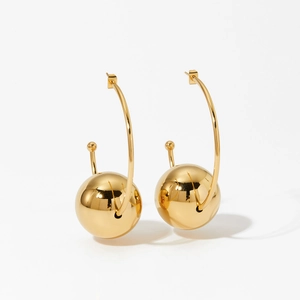Modern minimalist gold hollow C-shaped earrings with large polished metal spheres