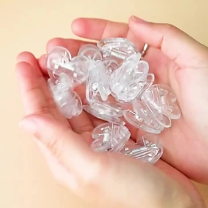 Bulk set of cute mini heart-shaped transparent plastic clips for photos and snacks
