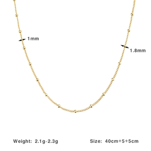 Detail of 1.8mm gold beads on a 1mm sterling silver chain with size measurements