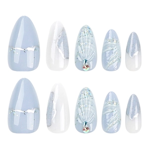 Handmade almond shaped press-on nails in blue and white with silver glitter and rhinestones