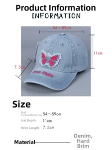 Detail showing pink bow patch and Free flight embroidery on blue denim baseball cap