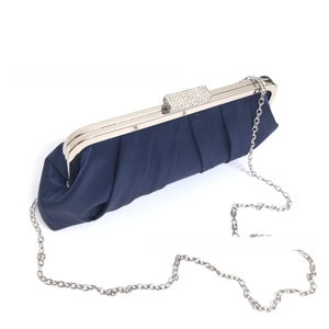 Detail of navy satin evening clutch with rhinestone buckle and silver chain strap