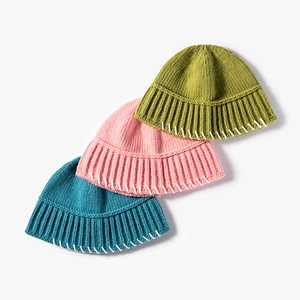 Women's rib-knit beanie set in green, pink, and blue with white whipstitch edge detail