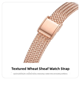 Detail of rose gold watch strap with intricate wheat ear weaving and metal buckle