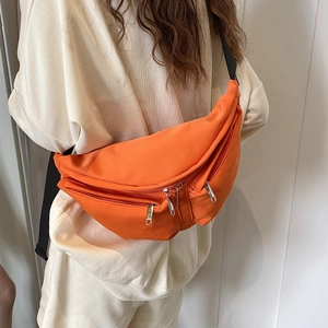 Orange large capacity nylon crossbody chest bag with wide strap on casual model