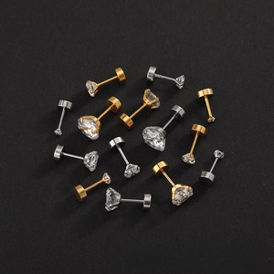 Detail of titanium steel flat back stud earrings with sparkling cubic zirconia in various sizes