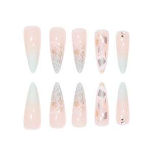 Lange Stiletto-Kunstnägel mit Pastell-Farbverlauf, Goldfolie und Glitzer-Verzierungen