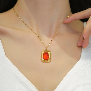 Minimalist gold plated titanium necklace with vintage red rectangular gemstone pendant