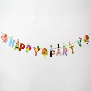 Close-up of Happy Party colorful paper banner with cake, balloon and mustache graphics